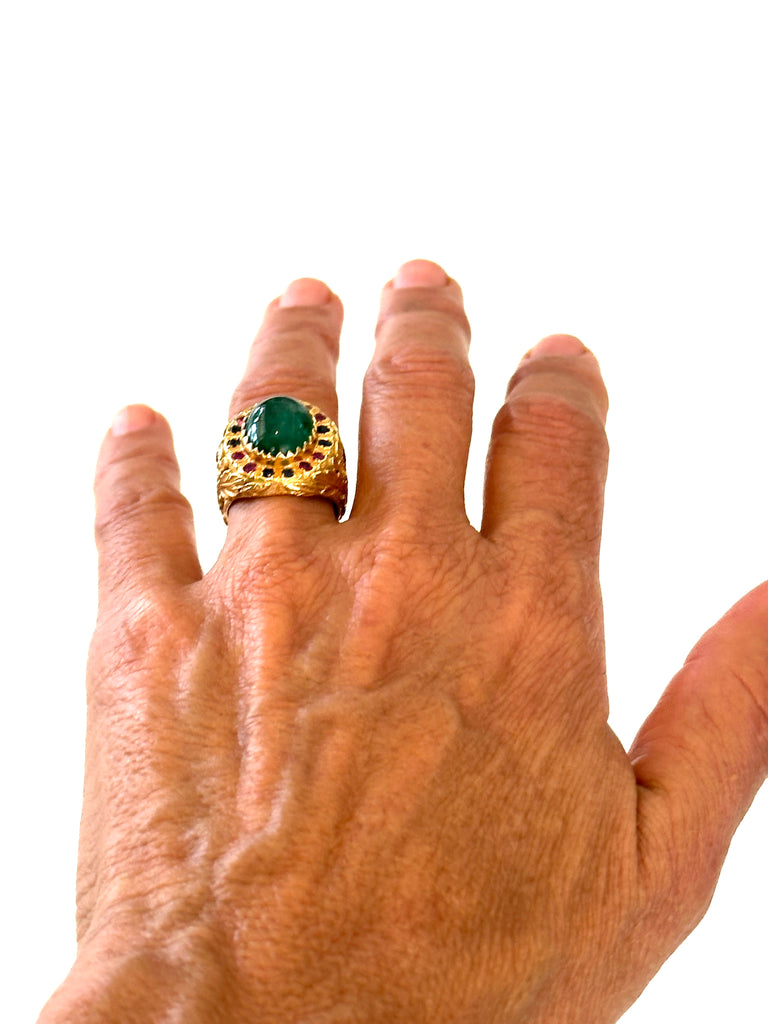 Emerald gold Ring .