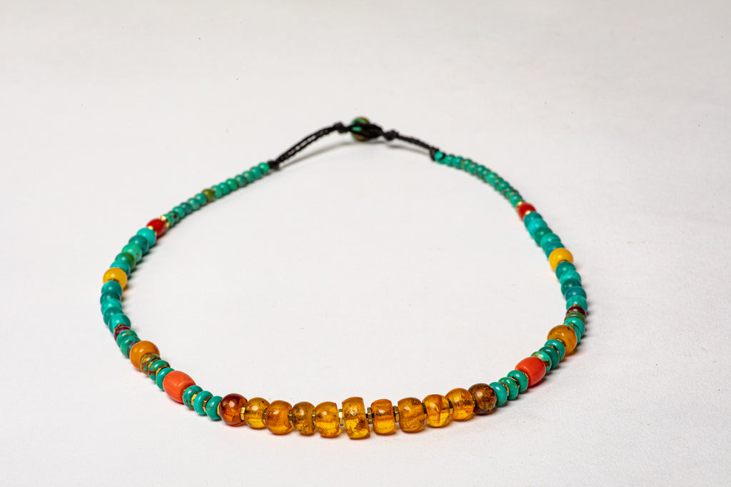 Turquoise necklace with Amber center