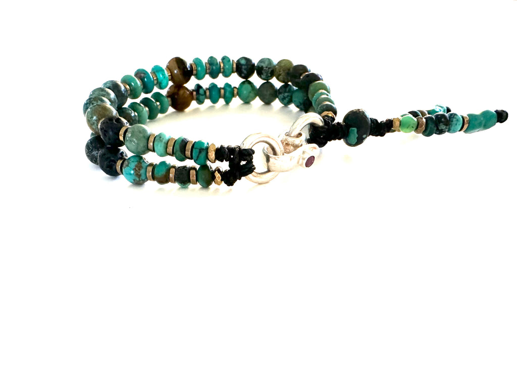 Bracelet with Turquoise Beads and tiger Eye .