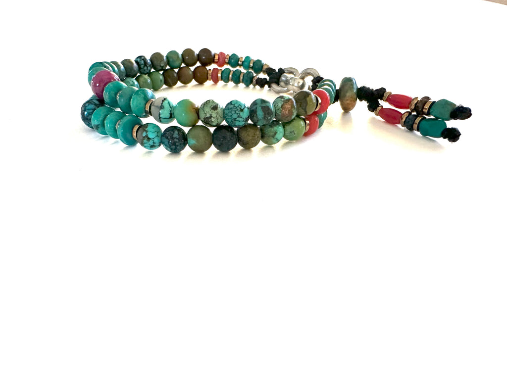 Bracelet with Turquoise and Ruby center.