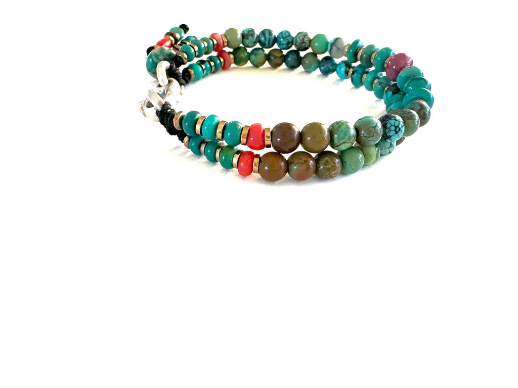 Bracelet with Turquoise and Ruby center.