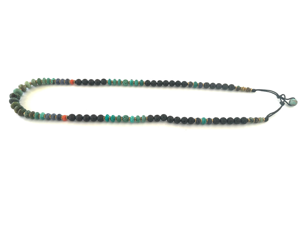 Lava necklace with Turqouise center.