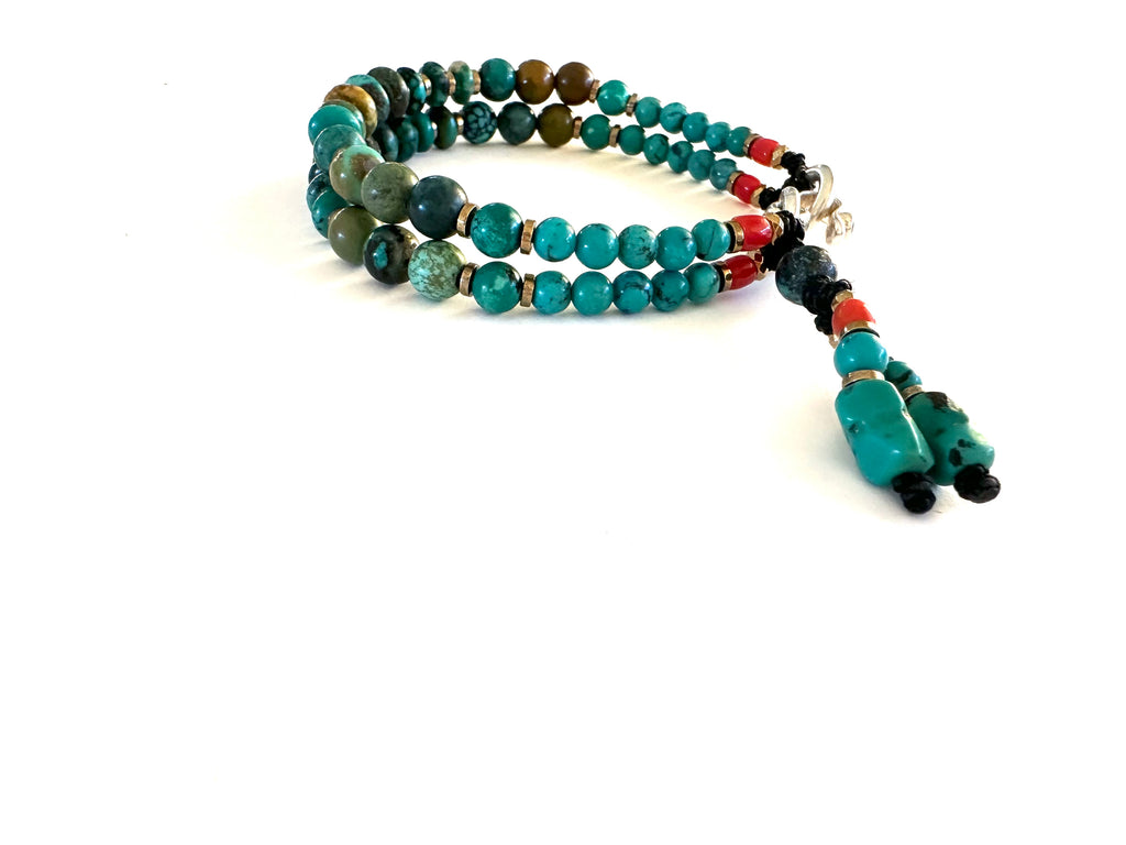Bracelet with Turquoise beads and red coral.