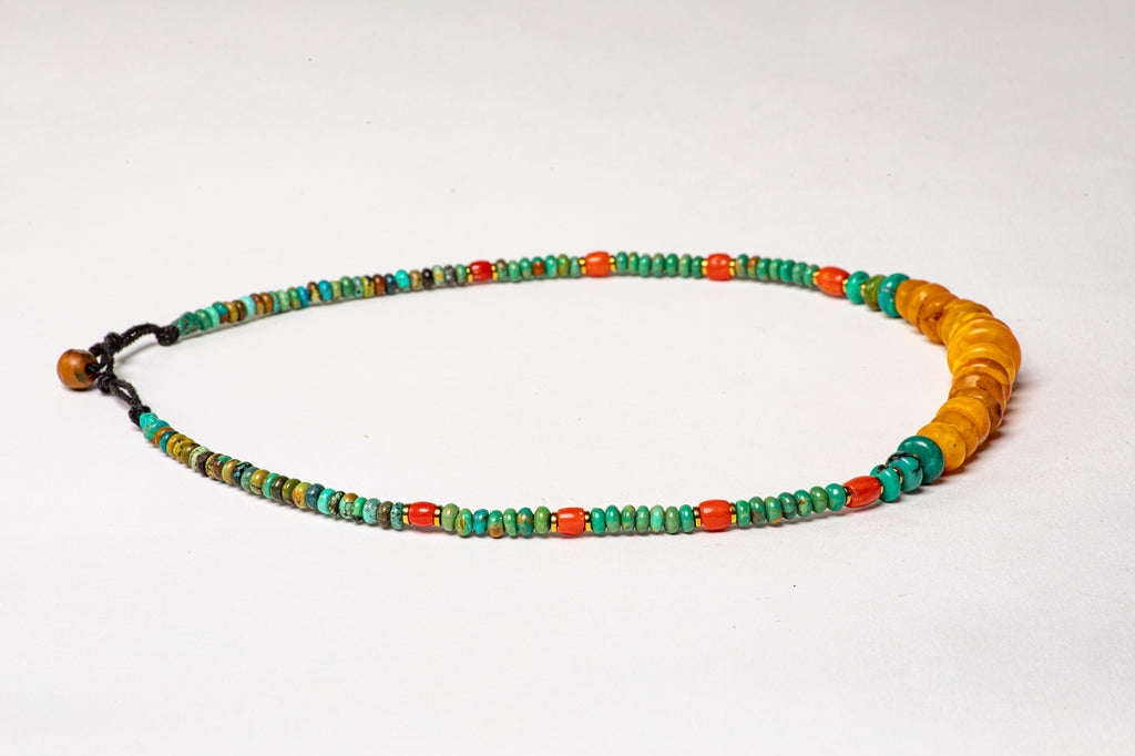 Turquoise necklace with antique milky Amber center