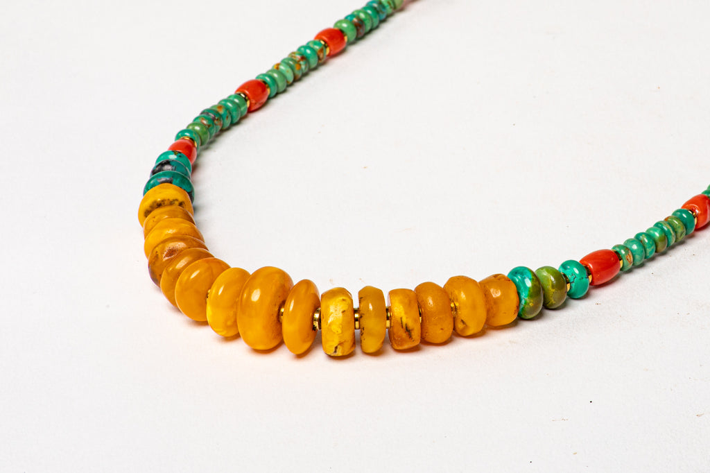 Turquoise necklace with antique milky Amber center