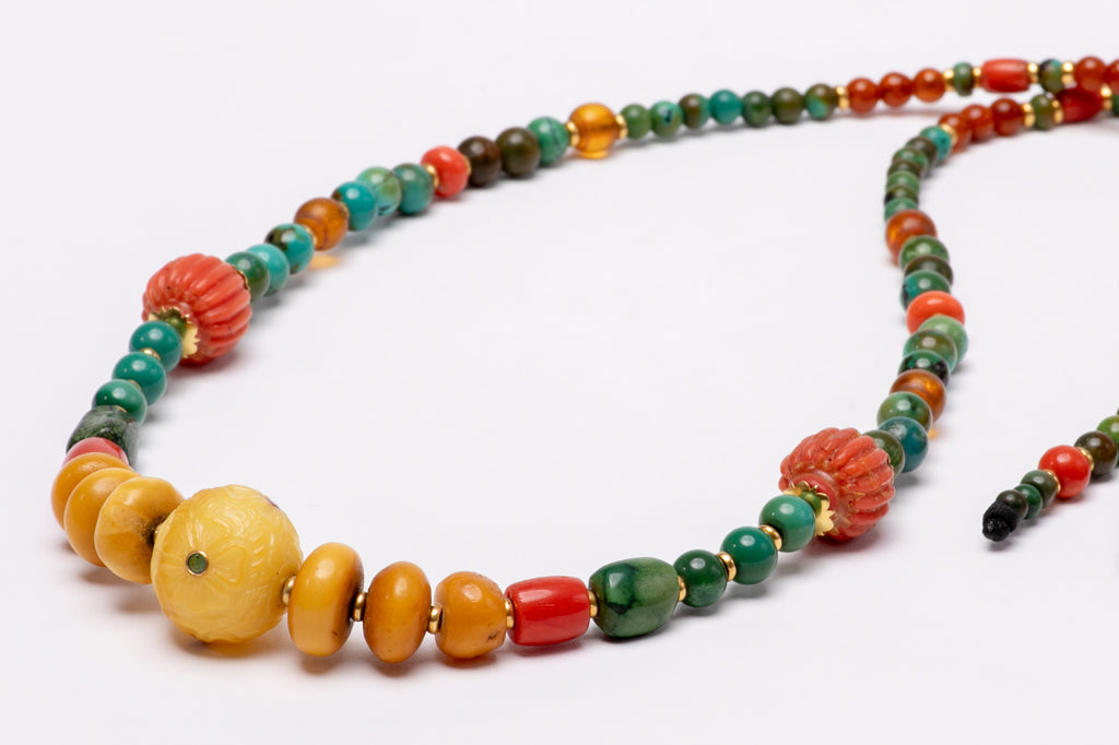 flower carved amber stone with gold beads mala necklace