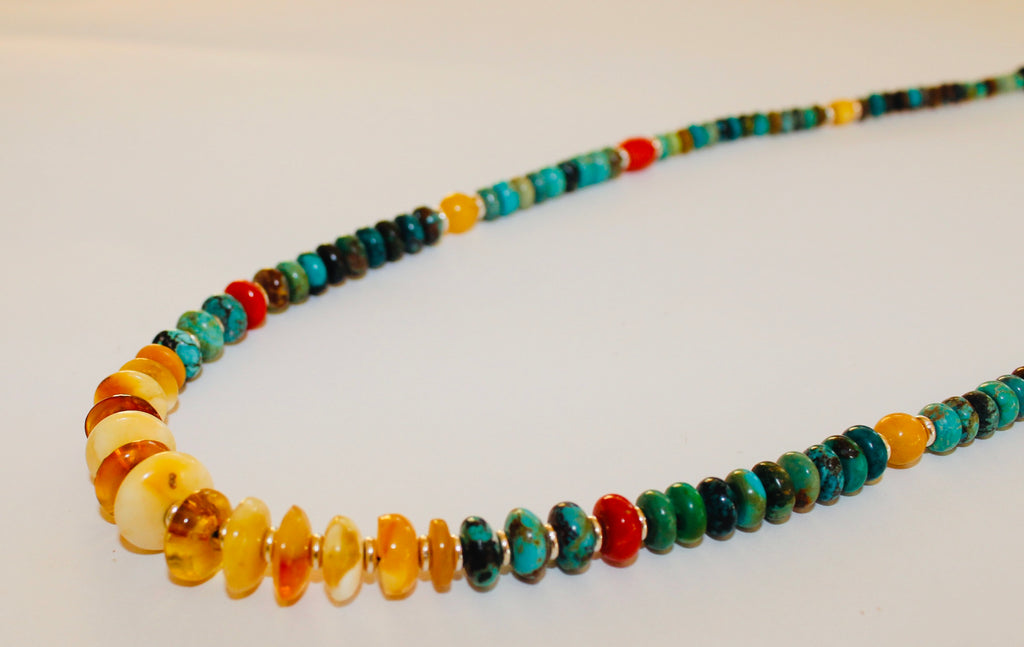 Turquoise necklace with milky Amber center